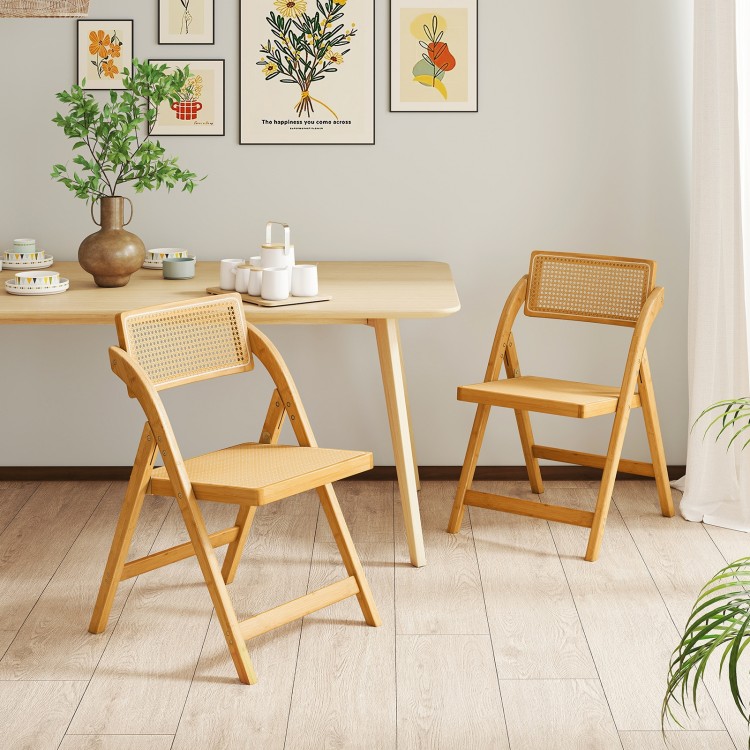 Natural rattan cane folding dining chairs set of 2 with rotatable backrests, ideal for kitchen or dining room use.
