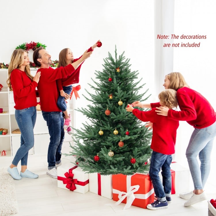 6 FT pre-lit artificial Christmas tree with 778 branch tips, featuring warm white LED lights for festive gatherings.
