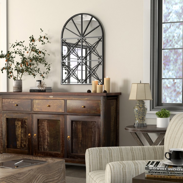 Arched window pane mirror with a black metal frame, 23x34 inches, ideal for brightening living rooms and entryways.