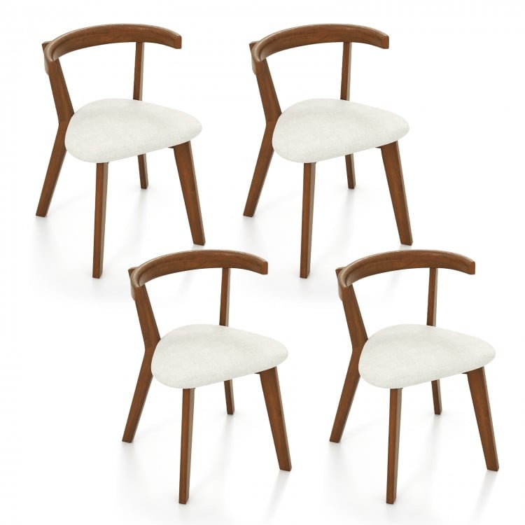 Set of 4 wood dining chairs with padded seats and curved backrests in walnut finish, perfect for dining or study areas.