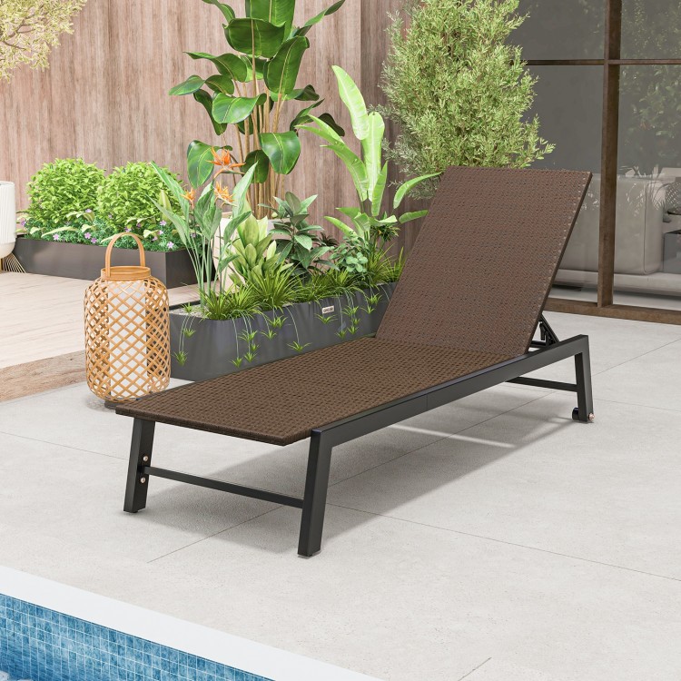 PE wicker chaise lounge chair with adjustable backrest and wheels, perfect for poolside relaxation and sunbathing.