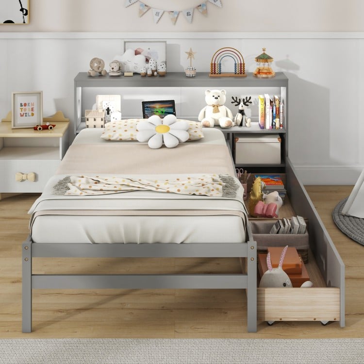 Twin size gray bed frame with LED light and bookcase headboard, featuring storage drawers and sturdy wooden.