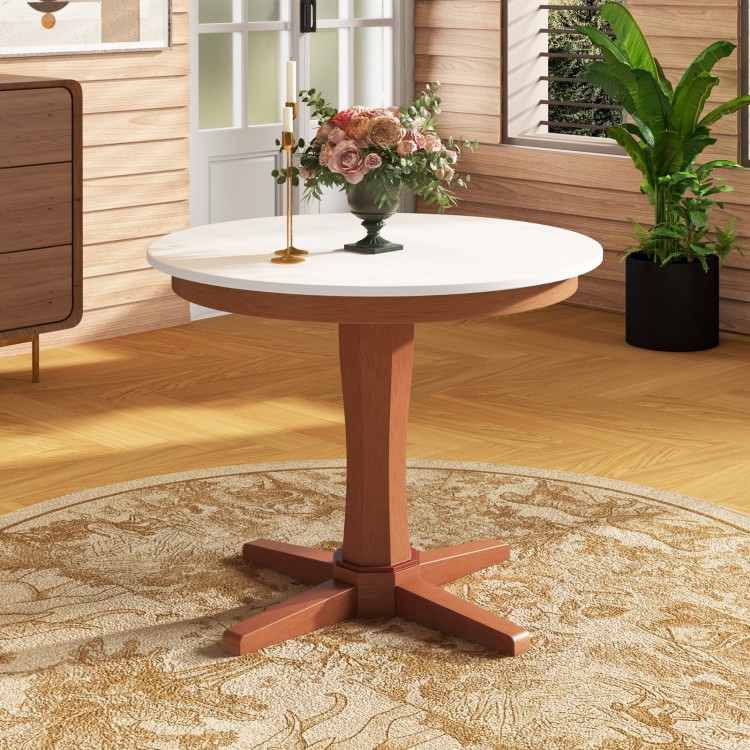 Round 35-inch wooden dining table with a pedestal base, cream white finish, perfect for gatherings in any home style.