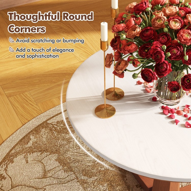 Round dining table with pedestal base in cream white finish, featuring elegant round corners for safety and style.