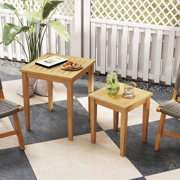 Teak wood outdoor patio nesting tables showcasing natural wood texture, perfect for versatile arrangements in backyard.