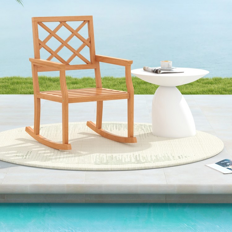 Teak wood oversized rocking chair with slatted seat and backrest, perfect for relaxing by the poolside or patio.