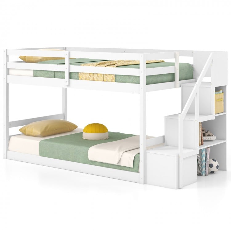 Close-up view of the solid wood frame of the twin over twin low bunk bed in white, showcasing durability and stability.