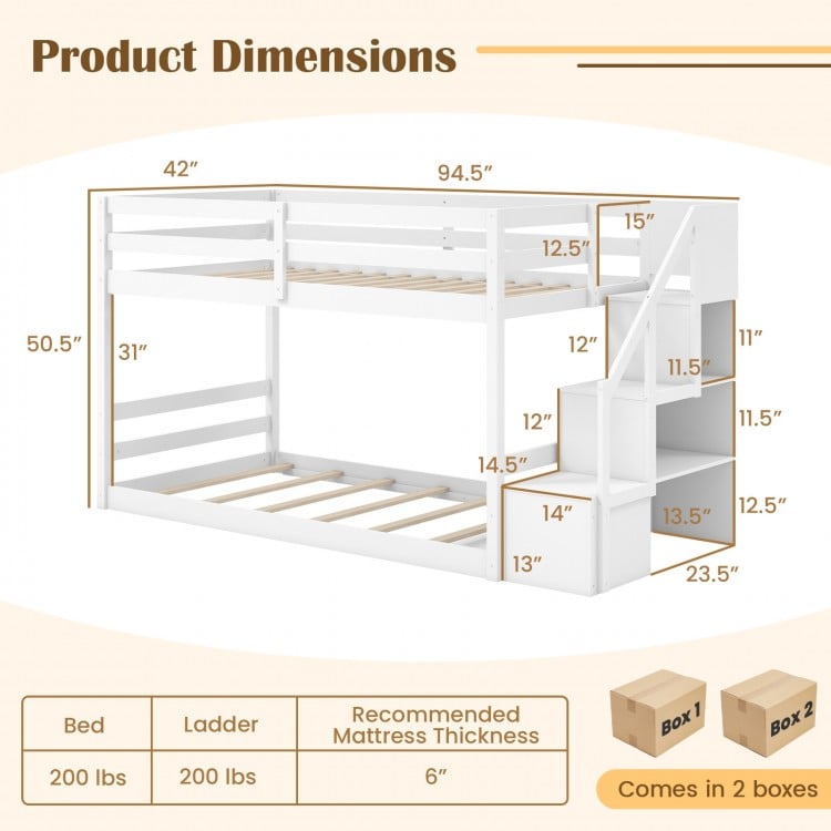 Twin over twin low bunk bed with storage stairs in white, featuring solid wood frame and safety guardrails for kids'.