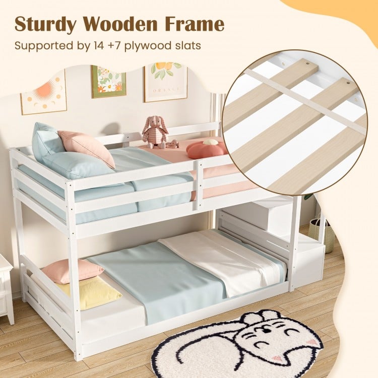 Twin over twin low bunk bed in white with solid wood frame, storage stairs, and 14+7 plywood slats for stability.