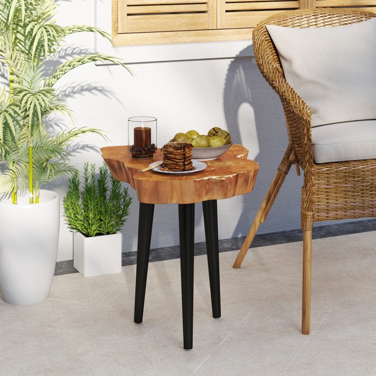 Irregular solid teak wood end table with mahogany tapered legs, perfect for indoor or outdoor use on patios or.