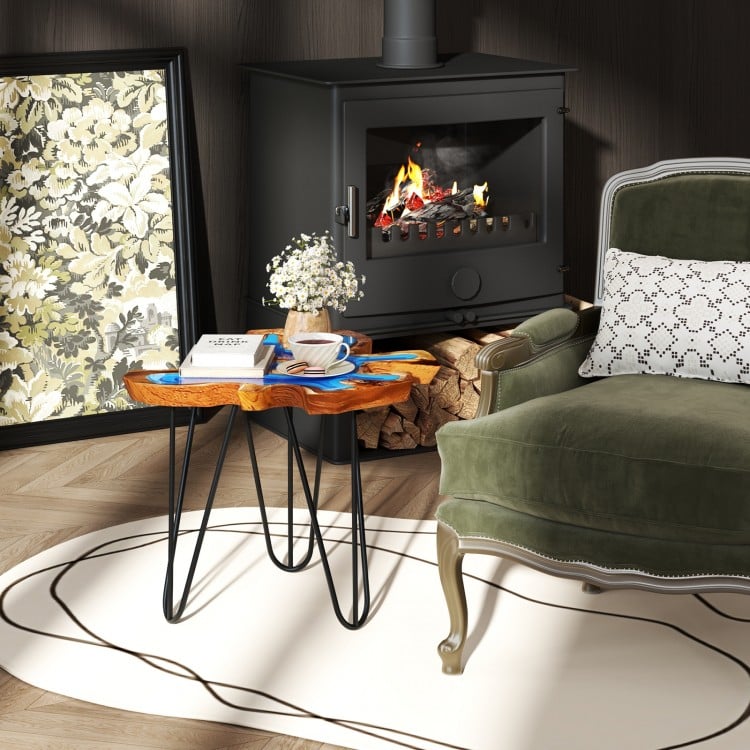 Irregular 21-inch teak wood end table with epoxy resin, featuring sturdy metal legs, ideal for living room or patio use.