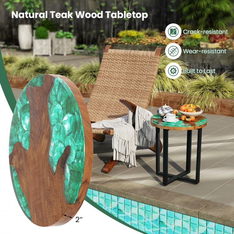 Round teak wood outdoor end table with epoxy resin top, featuring natural wood grain, perfect for patio or poolside use.