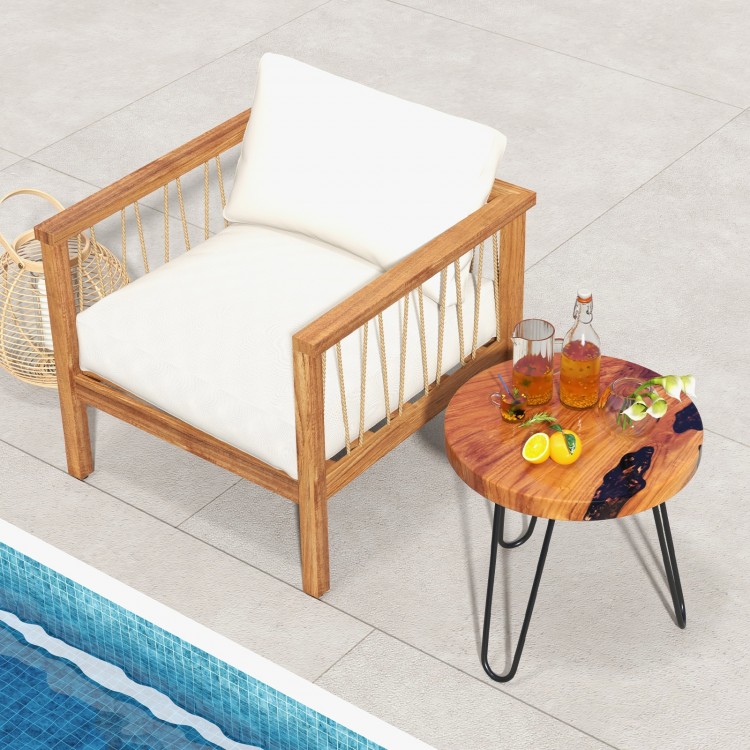 Rustic round solid teak wood live edge side table with metal legs, perfect for outdoor patio and cozy gatherings.