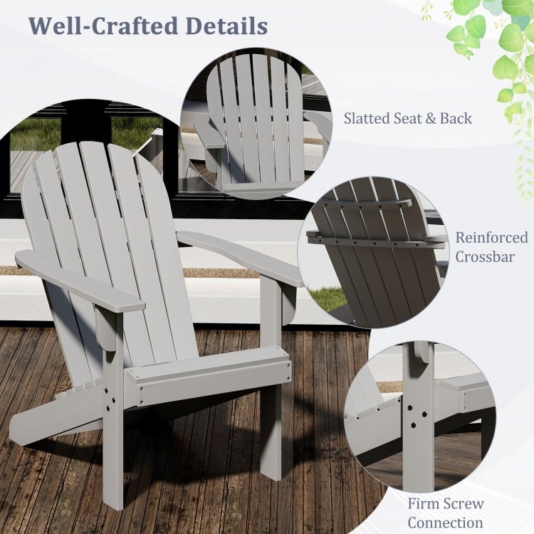 Gray acacia wood Adirondack chair with slatted design, inclined seat, and reinforced crossbar for backyard relaxation.