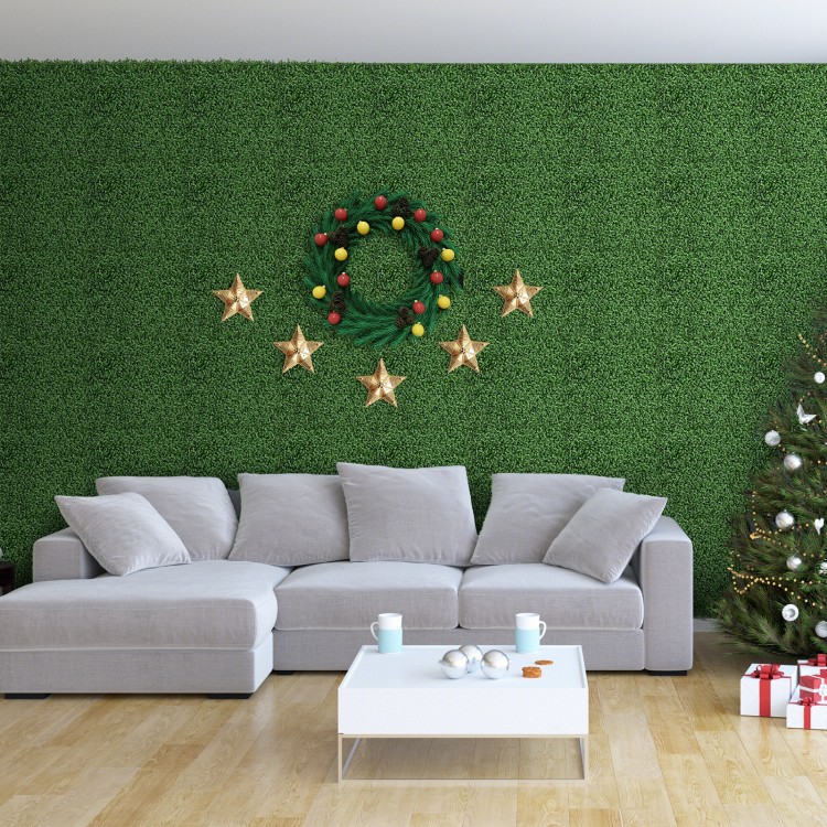 Artificial boxwood wall panels with dense leaves, perfect for indoor or outdoor decoration and easy to maintain.