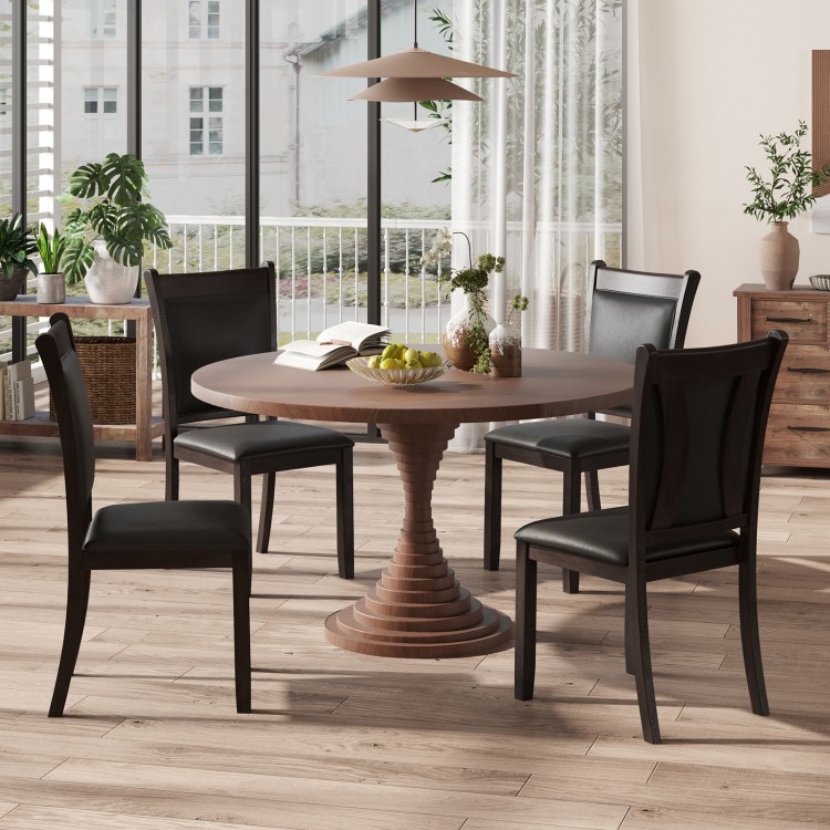 Gray faux leather dining chairs set of 2 with padded seats, featuring ergonomic backrests for comfort in a modern.