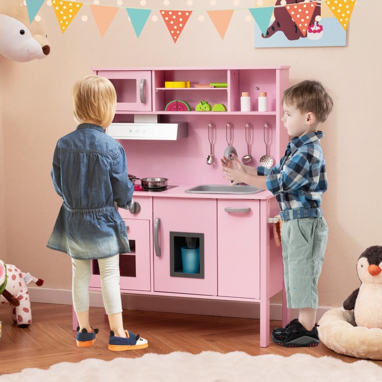 Wooden pretend play kitchen set in pink with kids cooking, featuring a removable sink and realistic appliances for.