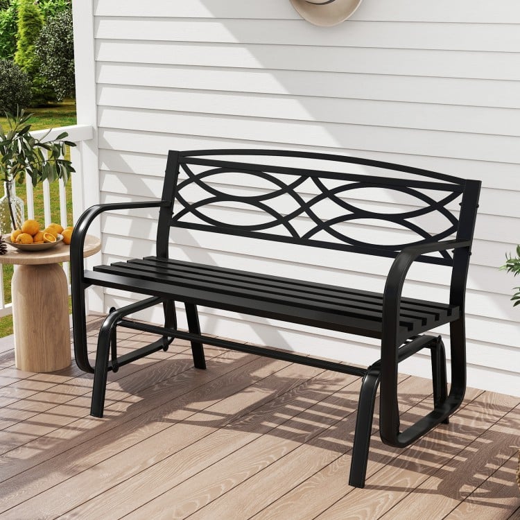 Front view of the black 2-person outdoor glider bench with slatted seat and inclined backrest for comfortable outdoor.