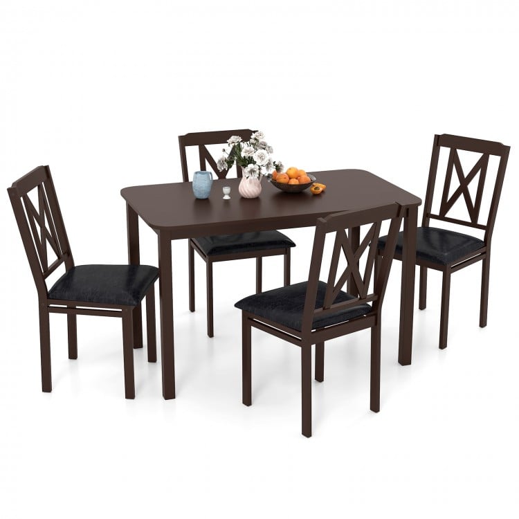 5-piece dining table set featuring a black rubber wood table and padded chairs, perfect for elegant dining spaces.