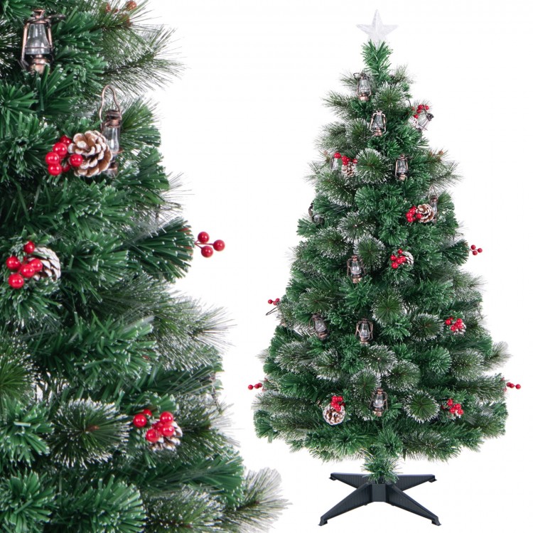 Close-up of the 5 feet artificial Christmas tree showcasing red berries, snowy pine needles, and decorative kerosene.