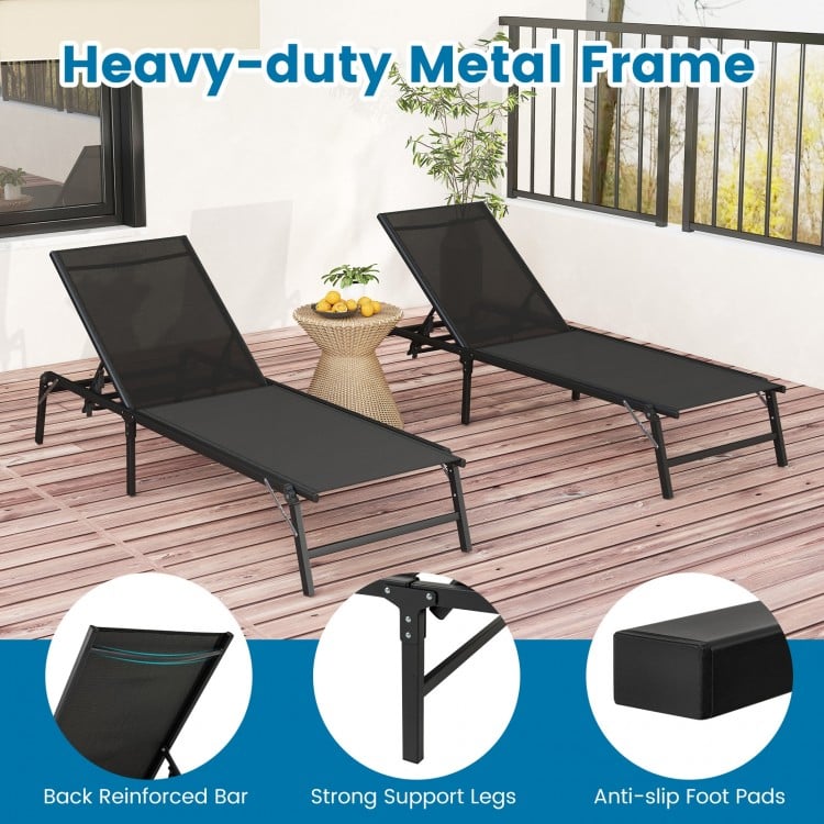 Side view of a black foldable chaise lounge chair showcasing its sturdy metal frame and breathable fabric, ideal for.