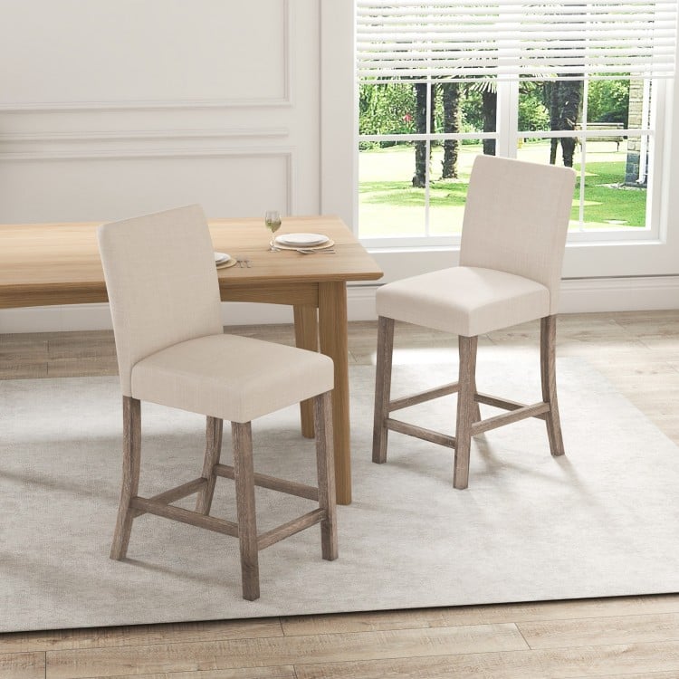 Beige counter height bar stools set of 2 with backrest and footrest, featuring solid rubber wood frame for stability.