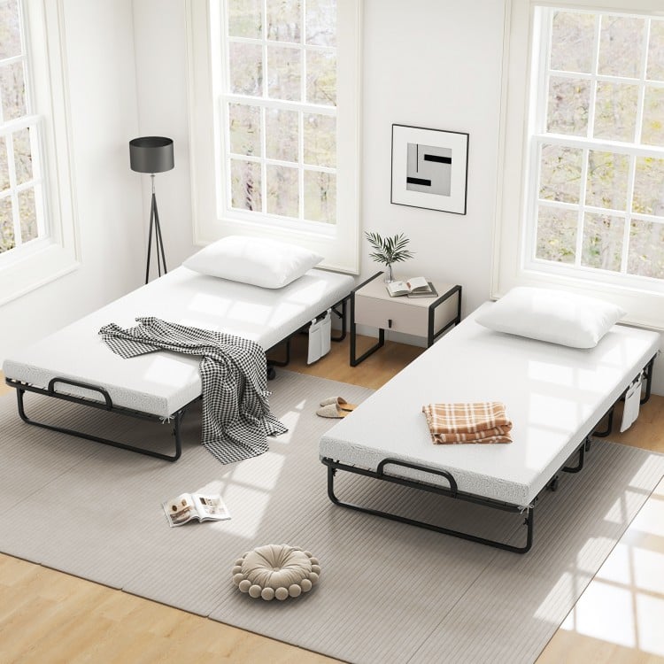 Twin size rollaway guest folding bed with a 4-inch mattress and heavy-duty frame, perfect for accommodating guests.