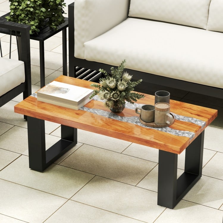 Teak wood patio table with river feel epoxy tabletop, featuring a spacious surface for snacks and drinks, ideal for.