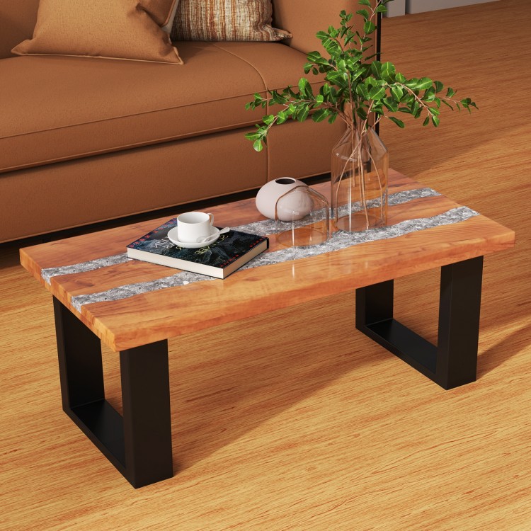 Teak wood patio table with river feel epoxy tabletop, featuring a spacious surface and sturdy black metal legs for.