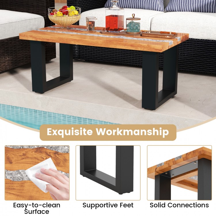 Teak wood patio table with river feel epoxy tabletop, featuring easy-to-clean surface and supportive feet for stability.