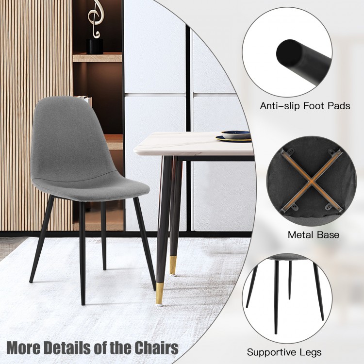 Gray dining chair with black metal legs, ergonomic backrest, and foam upholstery for comfort in various settings.