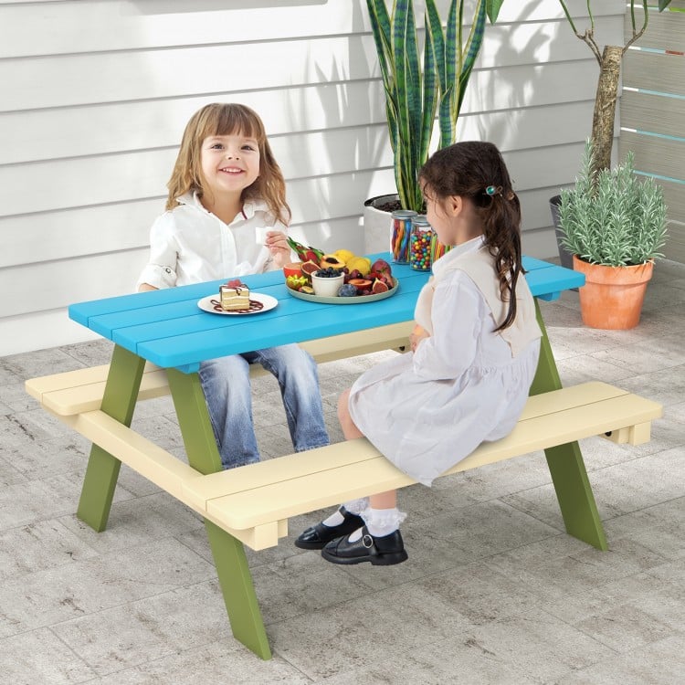 Kids wooden picnic table set in blue and cream, perfect for dining and activities in the backyard or garden.