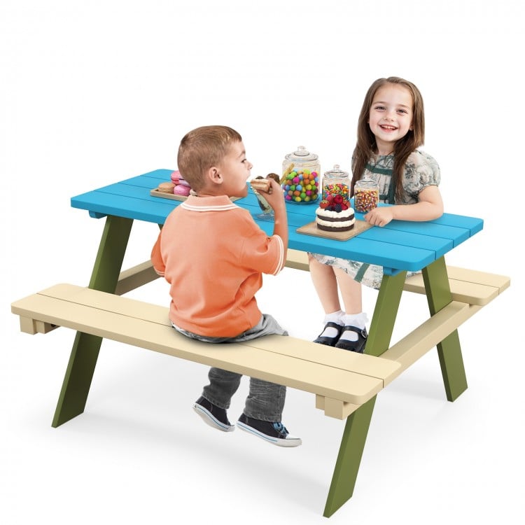 Kids enjoying snacks at a blue and beige acacia wood picnic table set, perfect for outdoor play and dining activities.