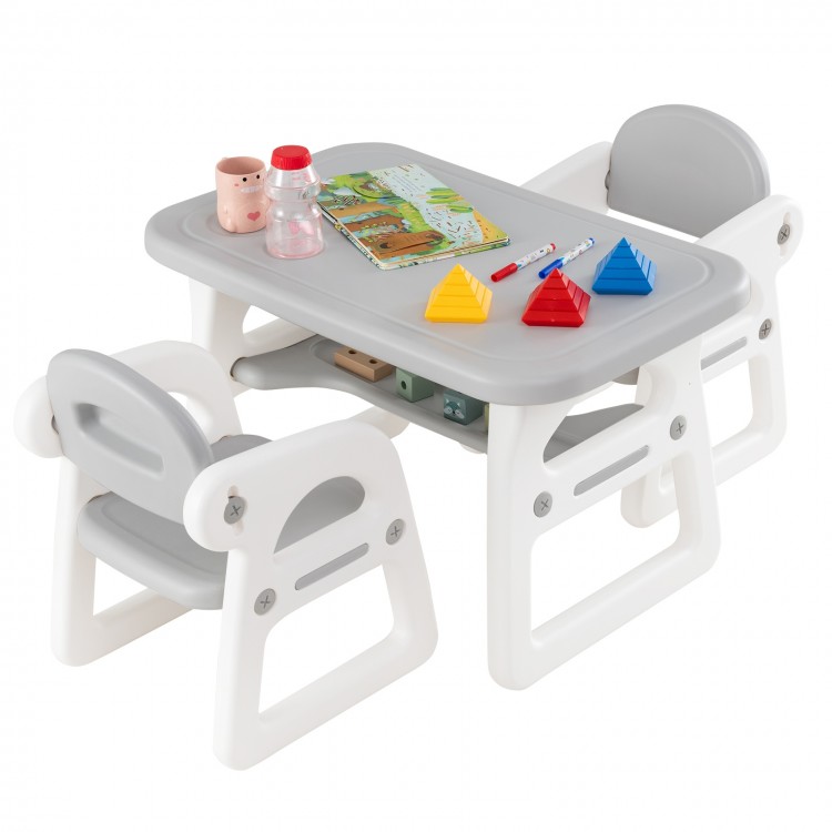 Kids table and chair set in gray with building blocks, featuring a spacious desktop and ergonomic design for children.
