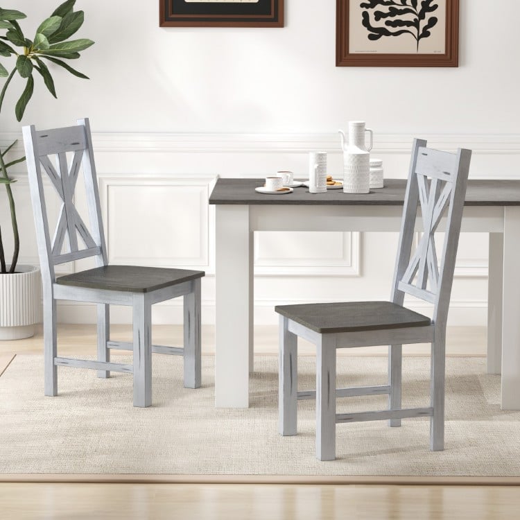 Farmhouse chair set of 2 with gray rubber wood frame and elegant hollowed backrest, perfect for dining rooms.