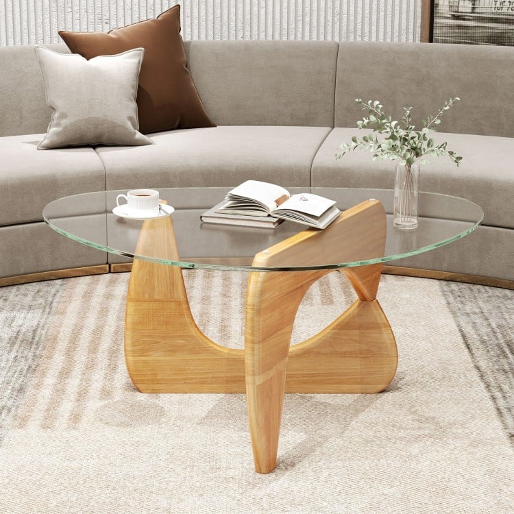 Triangle coffee table with tempered glass top and adjustable rubber wood base, ideal for living room decor and.