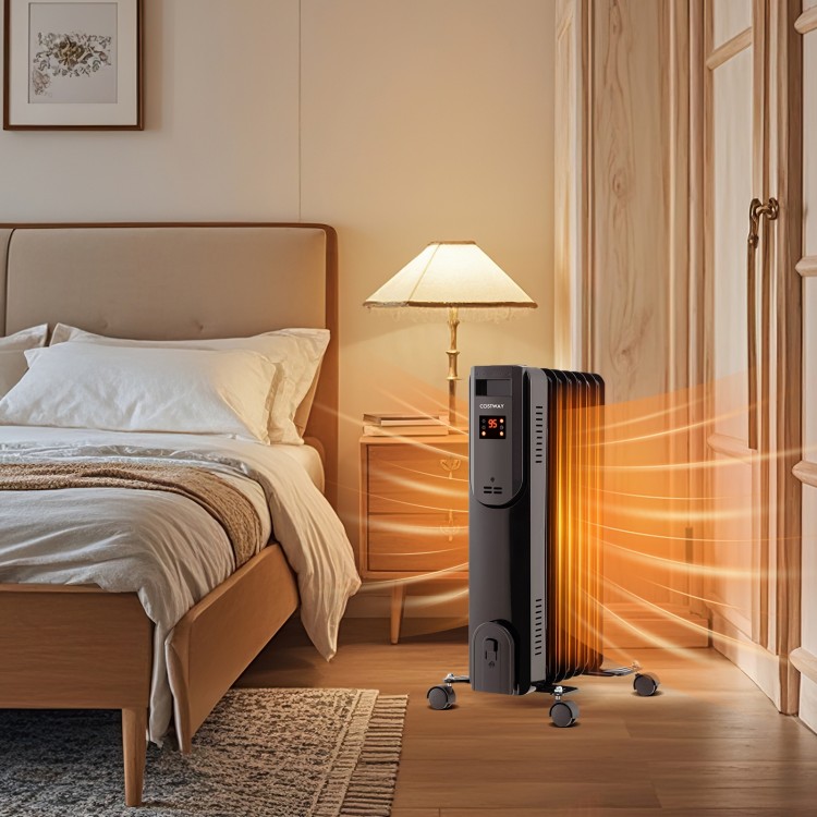 Oil filled radiator heater in black with adjustable thermostat, remote control, and LED display for cozy bedroom warmth.