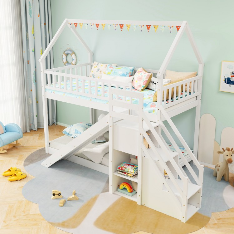 Twin over twin bunk bed with slide and staircase in white, featuring decorative house-shaped frame and ample storage.