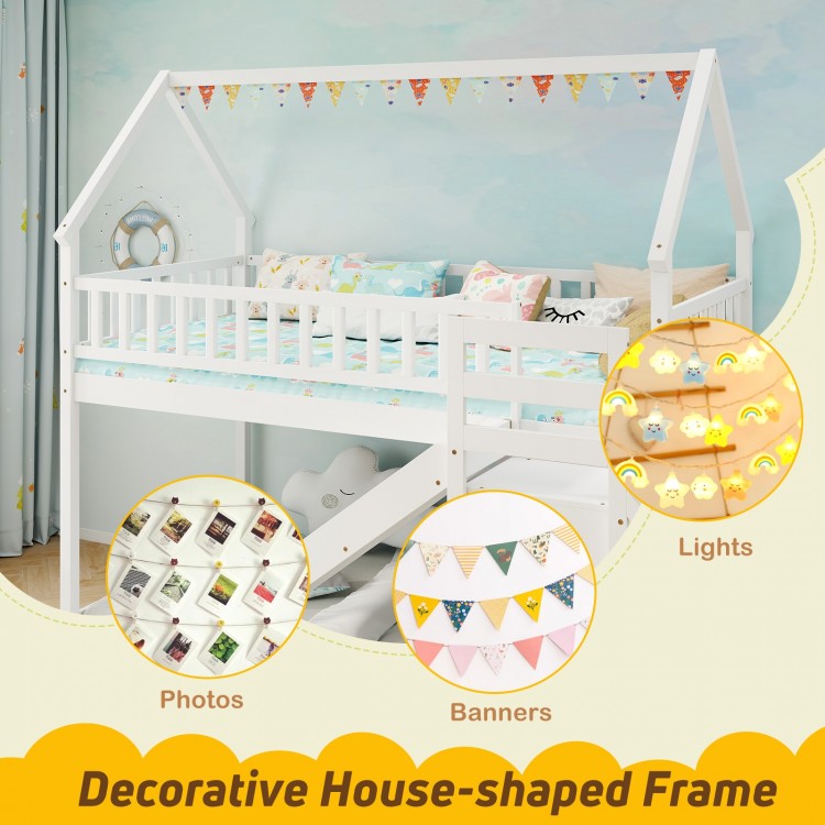 Twin over twin bunk bed with a decorative house-shaped frame, slide, and staircase for storage and play.