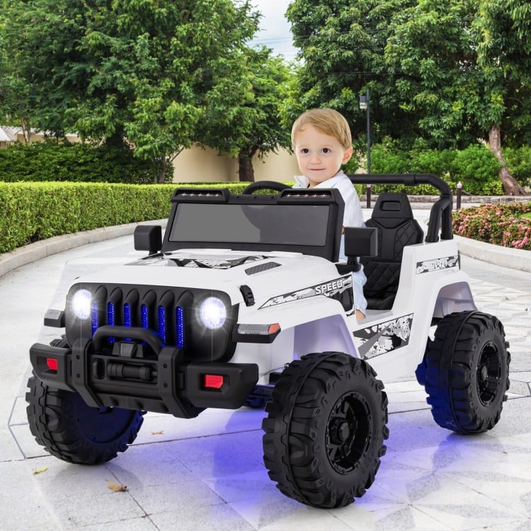 Kids ride-on Jeep car in white with remote control, featuring adjustable speeds and non-slip wheels for outdoor fun.