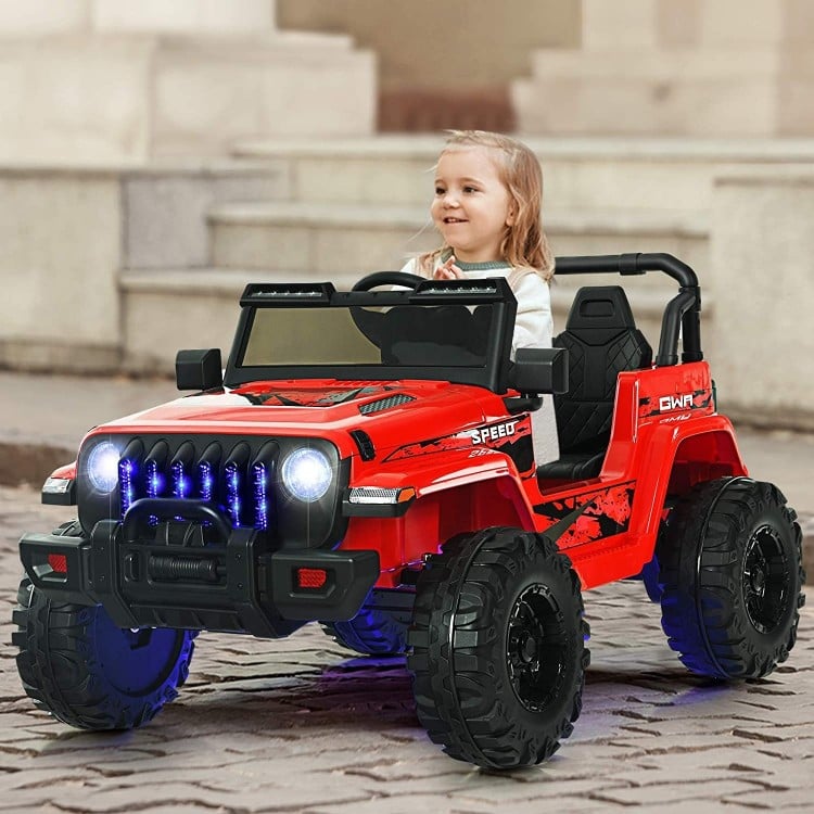 Red 12V kids ride-on Jeep car with remote control, featuring adjustable speeds and non-slip wheels for outdoor fun.