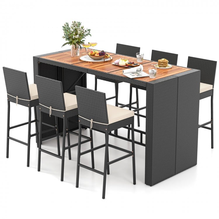 7-piece patio rattan bar set with acacia wood tabletop and soft seat cushions, ideal for outdoor gatherings in the.