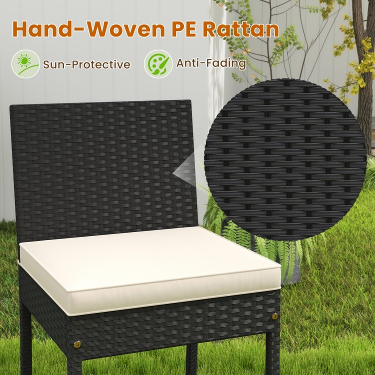 Close-up of hand-woven PE rattan chair with soft cushion, designed for comfort and durability in outdoor settings.