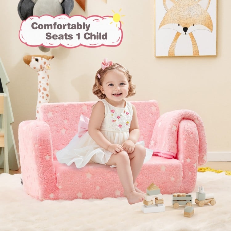 Pink 2-in-1 folding kids couch with blanket, designed for comfort and safety, perfect for reading or playing.