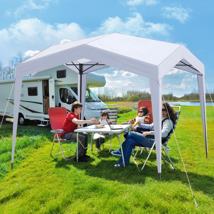 Pop up canopy tent in white with family enjoying a picnic, providing UPF50+ sun protection for outdoor activities.