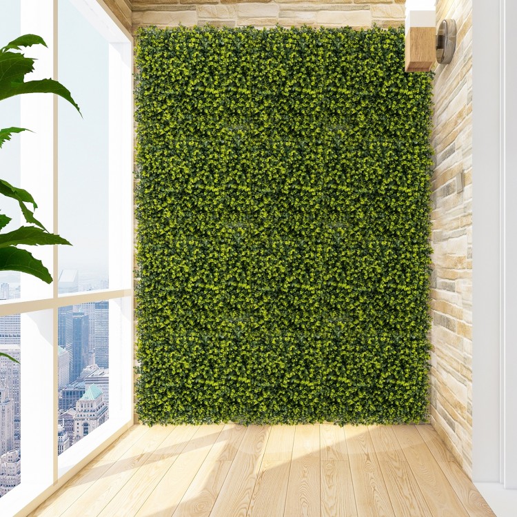 Artificial hedge eucalyptus panels in a vibrant green, perfect for creating privacy screens or green wall backdrops.