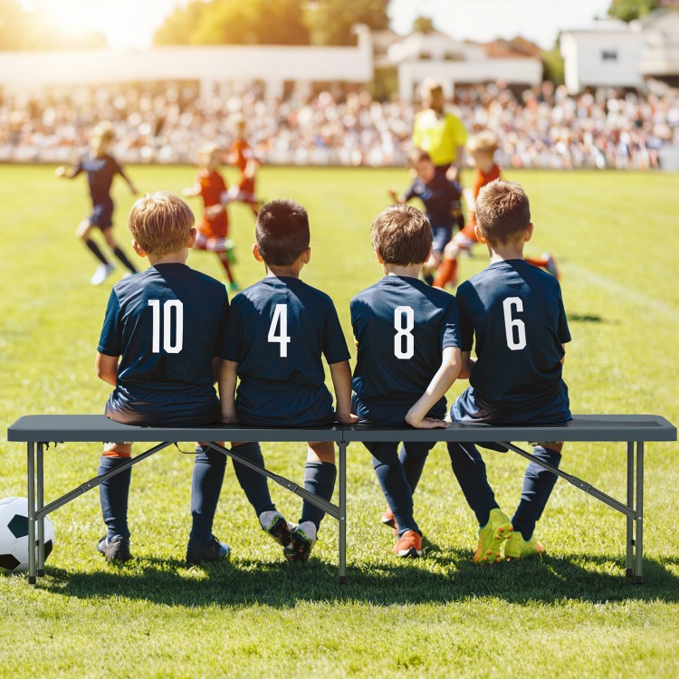 Portable 6 feet plastic folding bench in gray, accommodating up to 4 people, ideal for outdoor events like soccer games.
