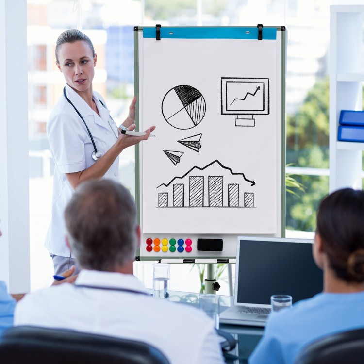 Height-adjustable mobile whiteboard with round stand, showcasing presentation graphics, ideal for office or teaching.