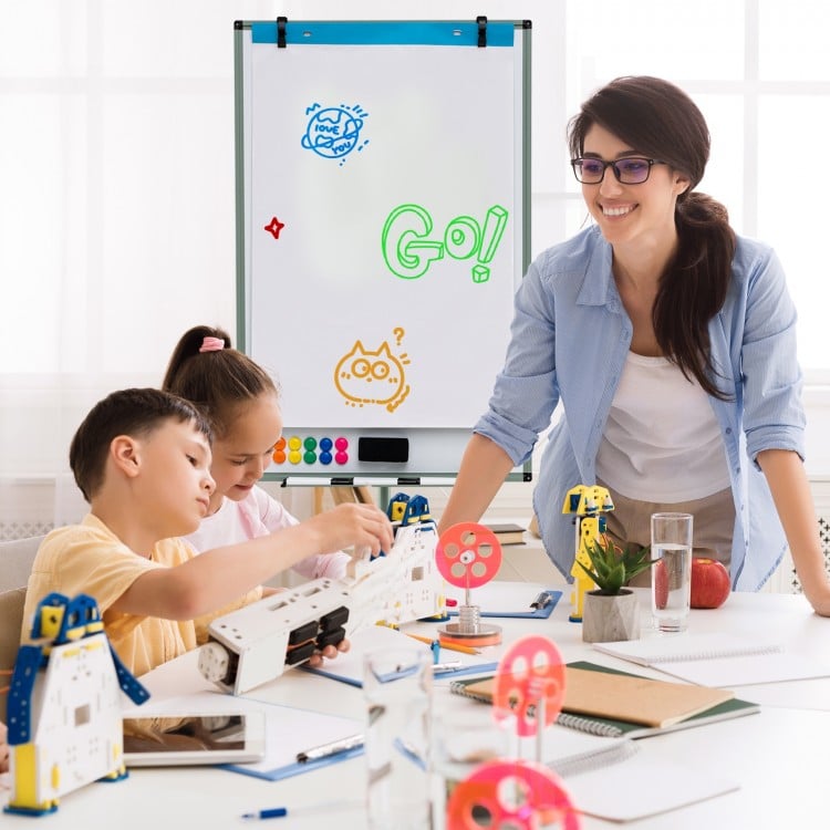 Height-adjustable mobile whiteboard with round stand, ideal for teaching and presentations, shown in a classroom.