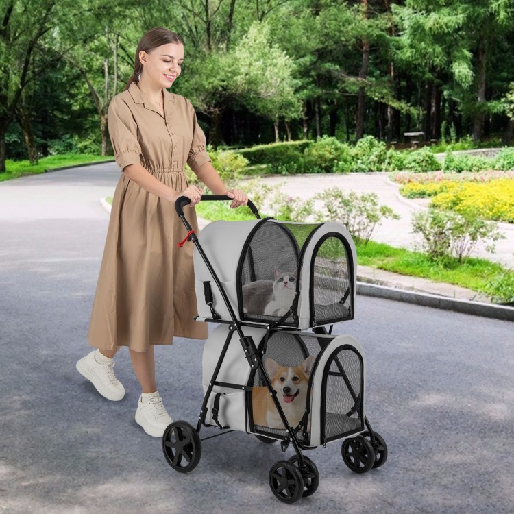 Double pet stroller with detachable carriers in gray, featuring mesh windows and ergonomic handle for comfortable.